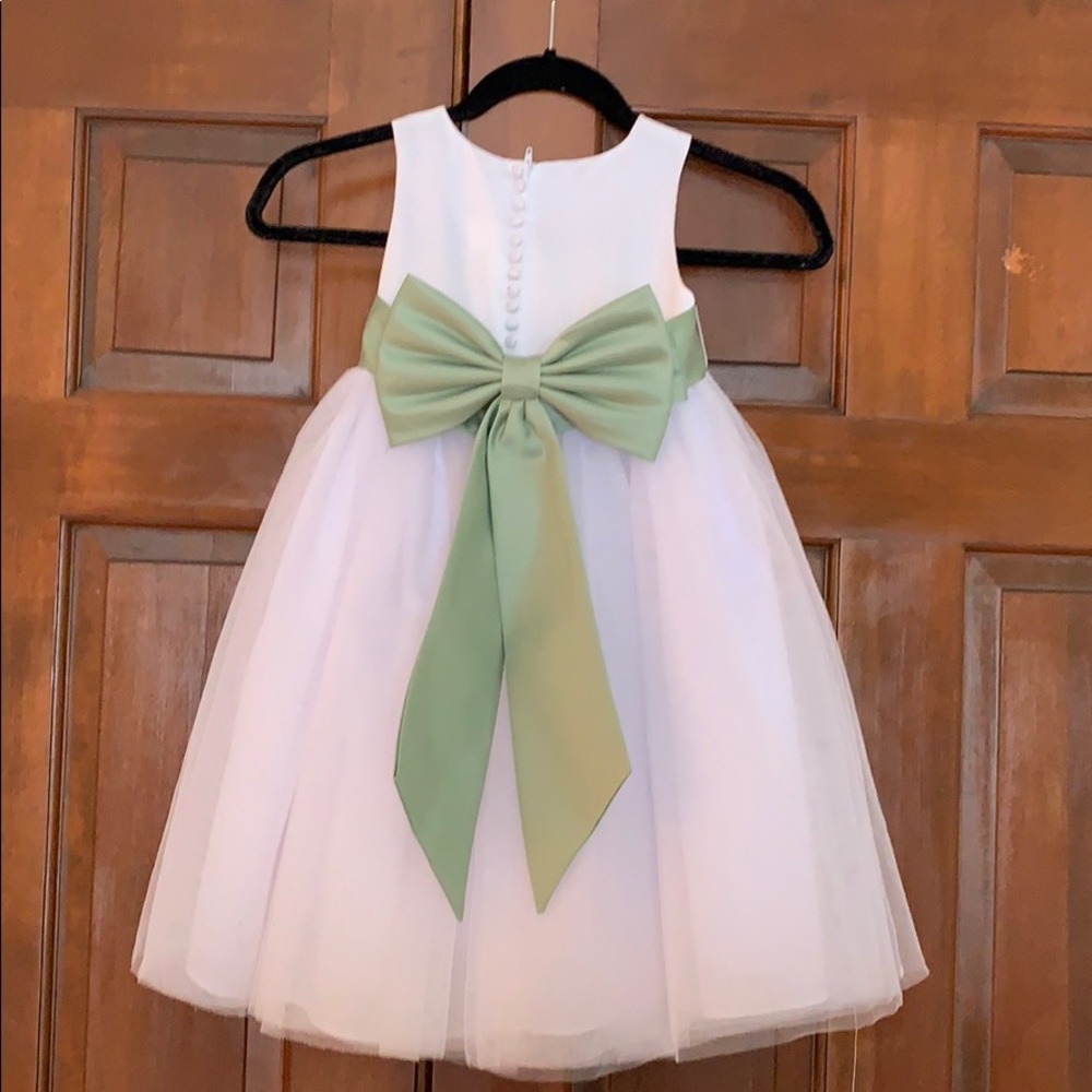 White toole and satin dress with sage bow